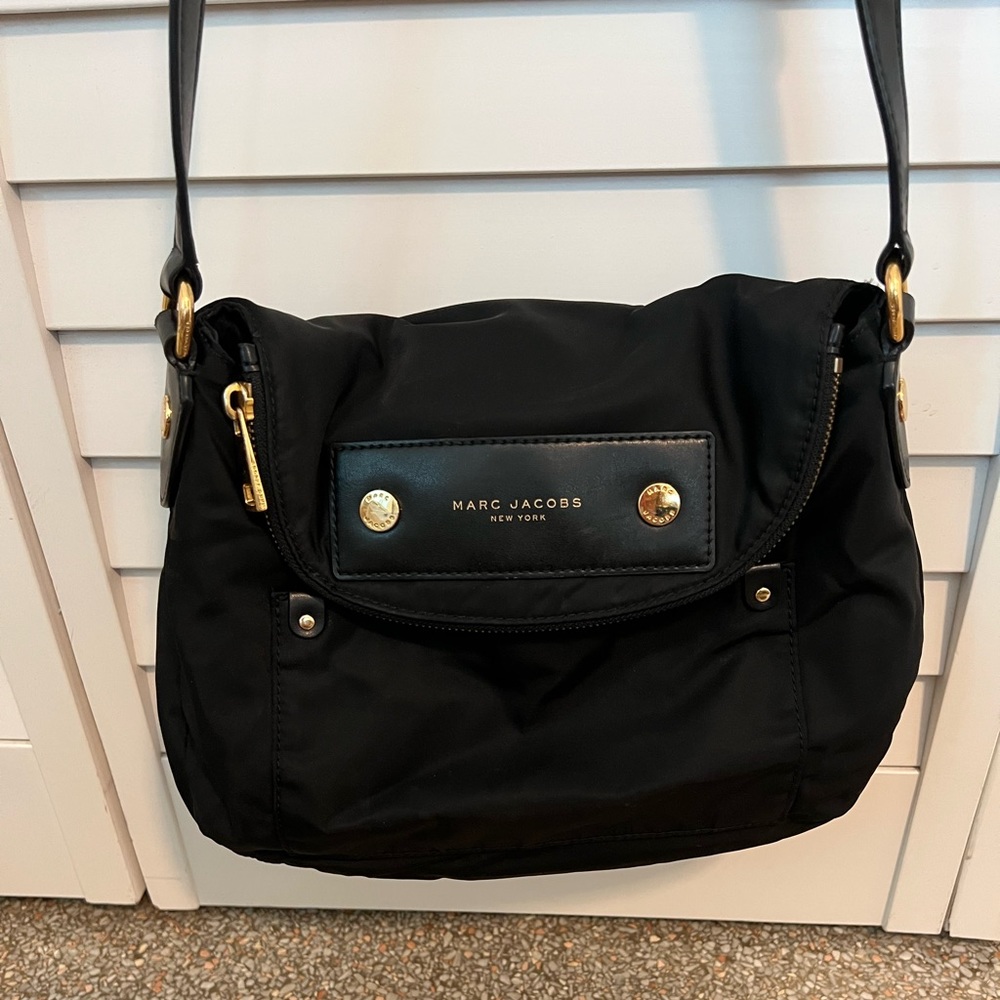 Marc Jacobs nylon crossbody bag. Very roomy, but not too big.